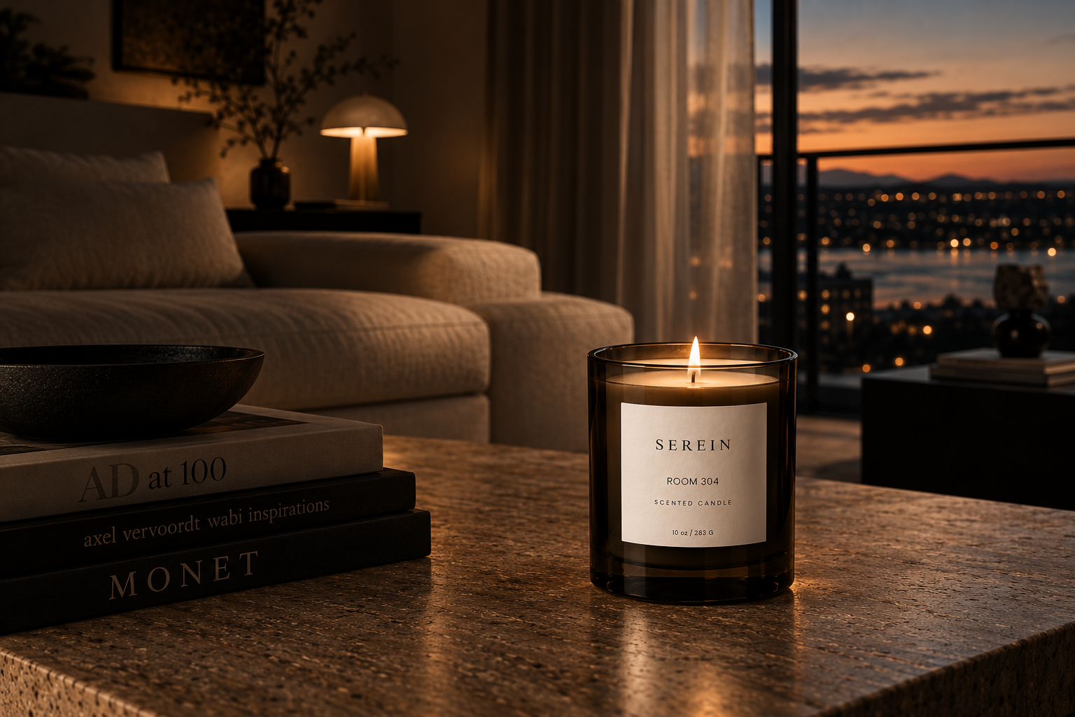 Room 304 candle glowing in a warm hotel lounge at dusk